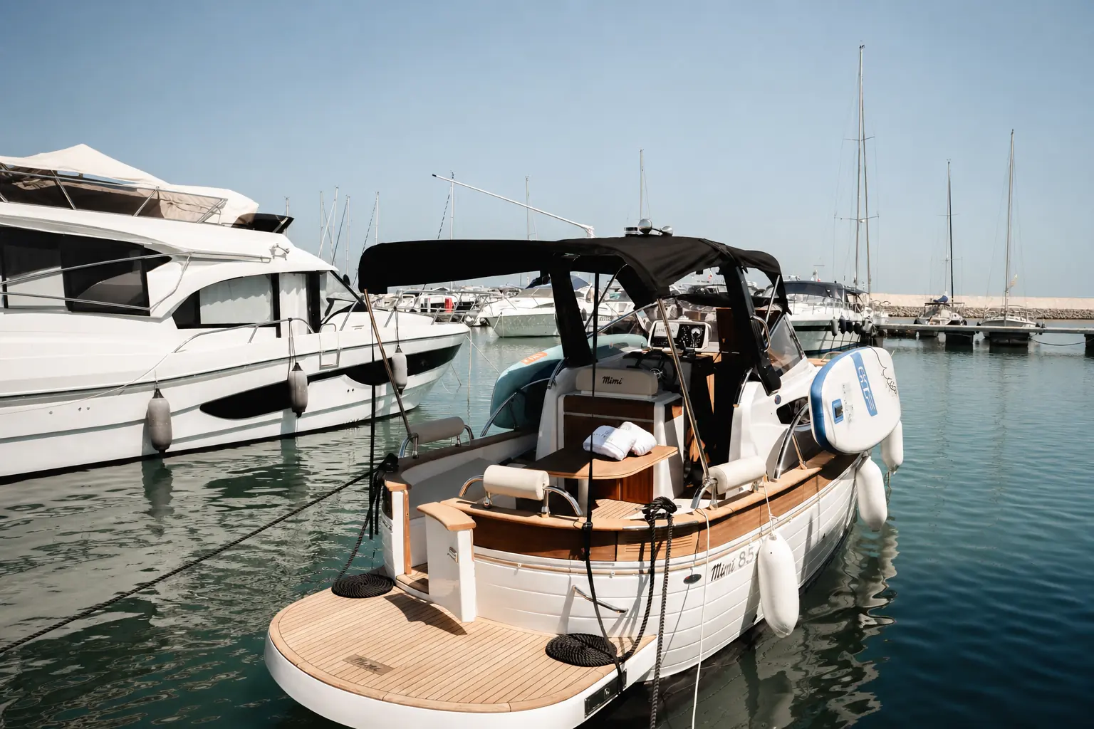 Il Pomeriggio — shade across the deck, bright sea beyond